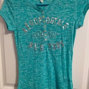 Aeropostale short sleeve shirt.  Blue/green with silver lettering. Small